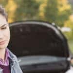 woman calling for car assistance