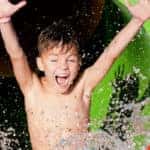 Boy on a water slide
