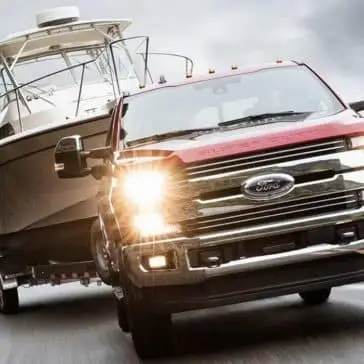 2019 Ford Super Duty Lariat tows a boat