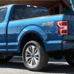 2019 F-150 parked outside of a house