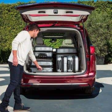 2018 Chrysler Pacifica cargo space loaded with suit cases