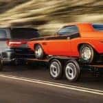2018-Dodge-Durango-Towing-Vehicle-on-Highway