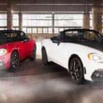 Two FIAT 4C roadsters parked next to one another