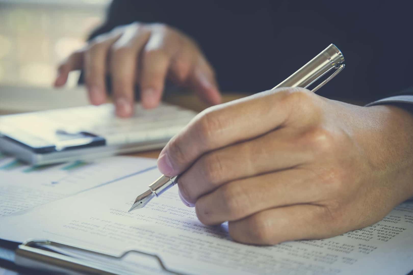 Signing and initialing paperwork