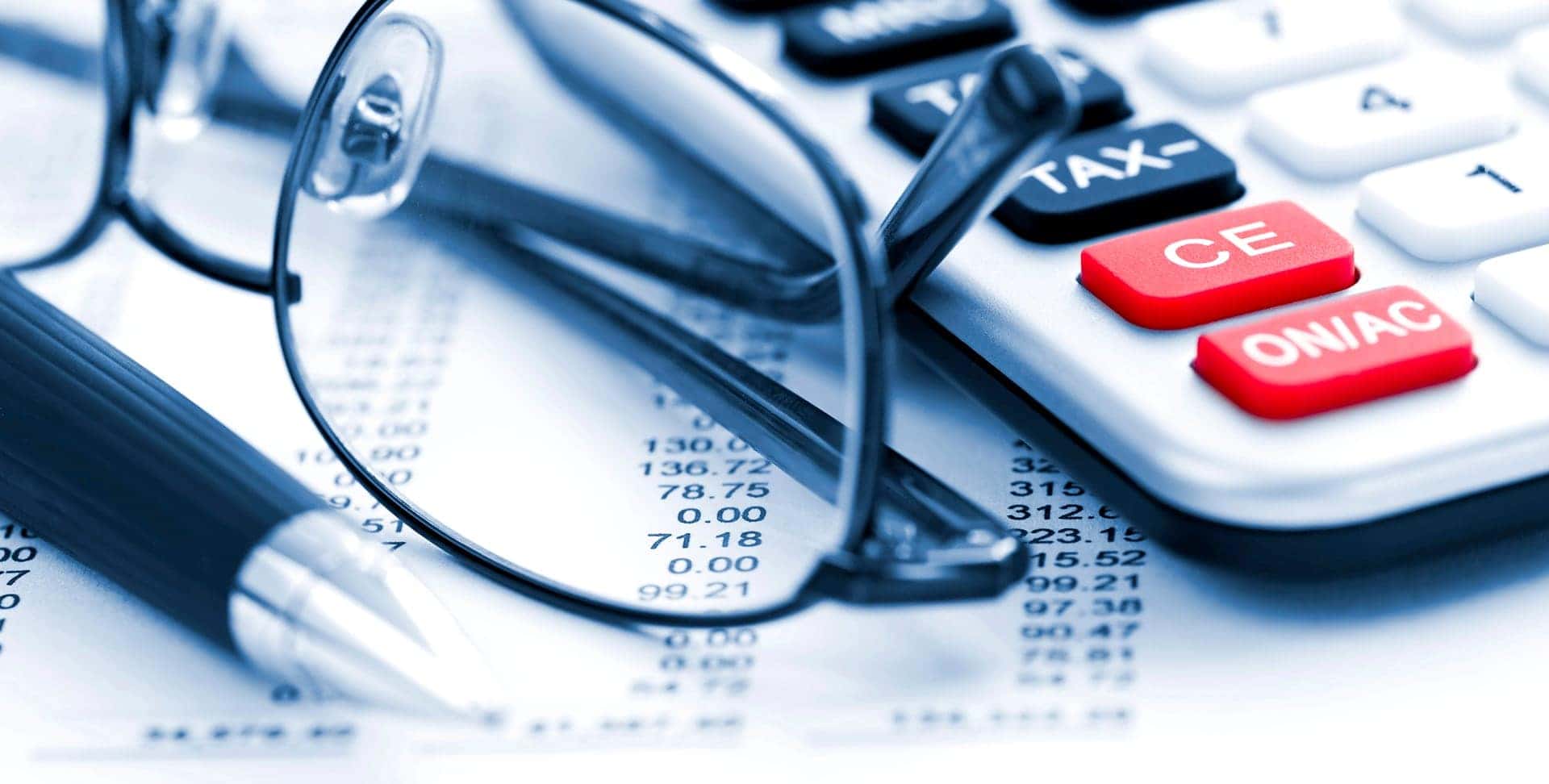 calculator, glasses, pen