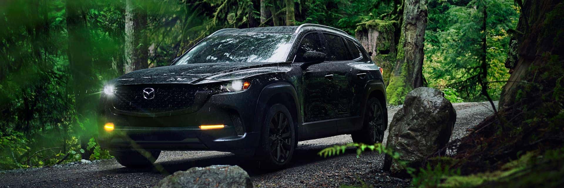 2026 mazda cx-50 driving in woods