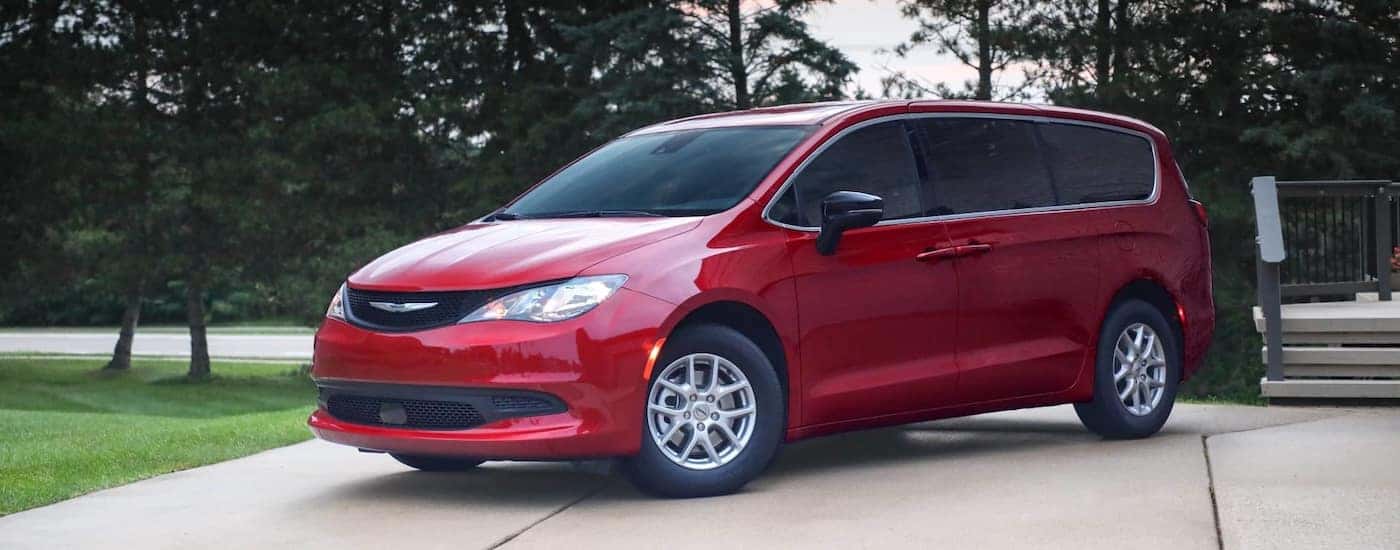 Red Chrysler Voyager minivan