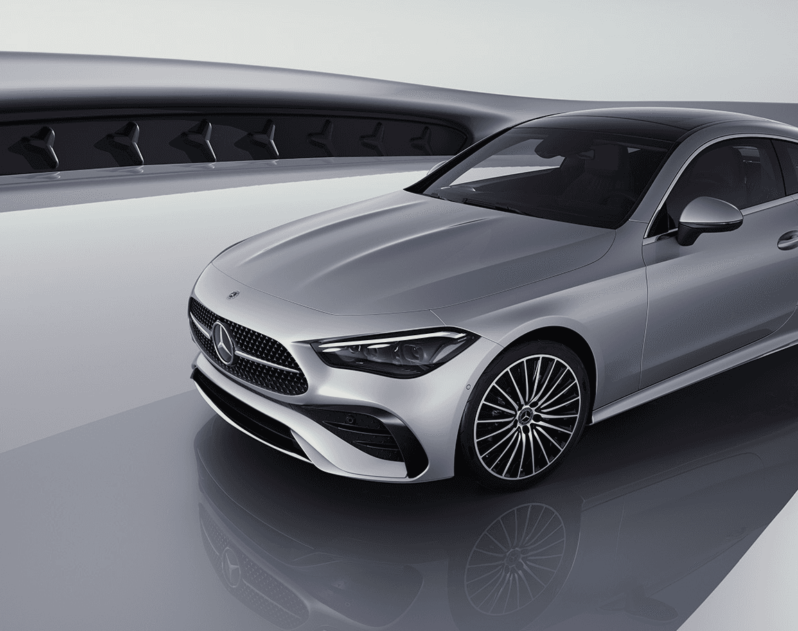 Gray Mercedes Benz on shiny road