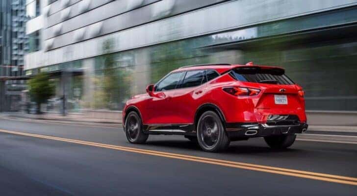 A red 2020 Chevy Blazer is shown from the rear at an angle.