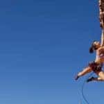 woman rock climbing