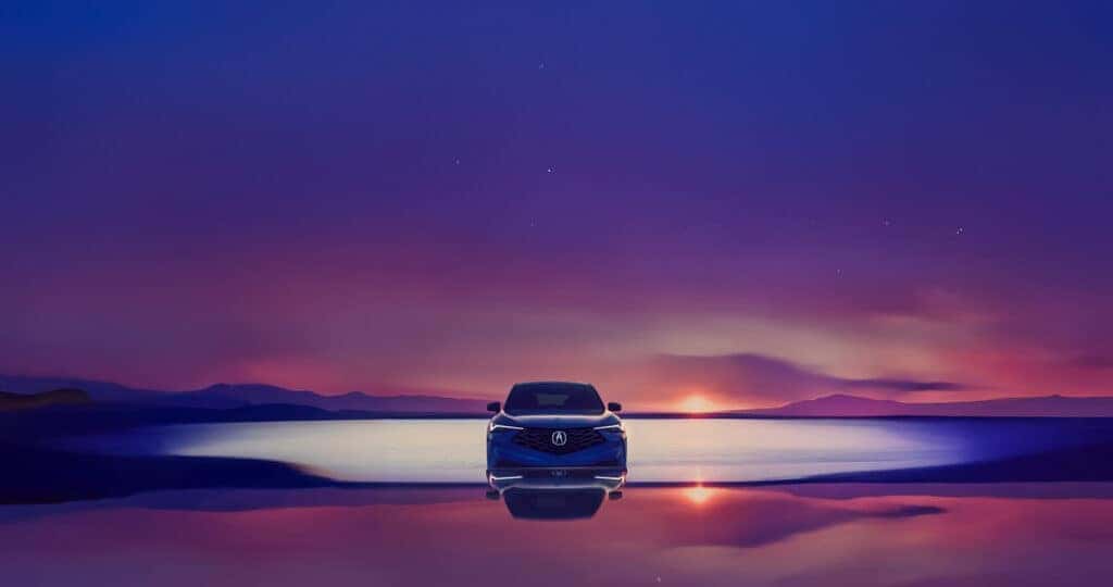 2025-Acura-ADX-in-the-desert-with-a-reflection-and-colorful-sky