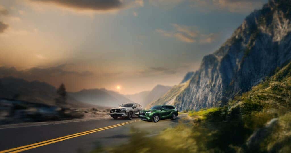 2025 Acura MDX vs Toyota Highlander driving through the mountains