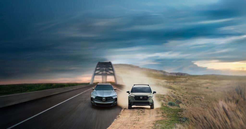 2025 Acura RDX vs Honda CR-V 2026 driving down roads