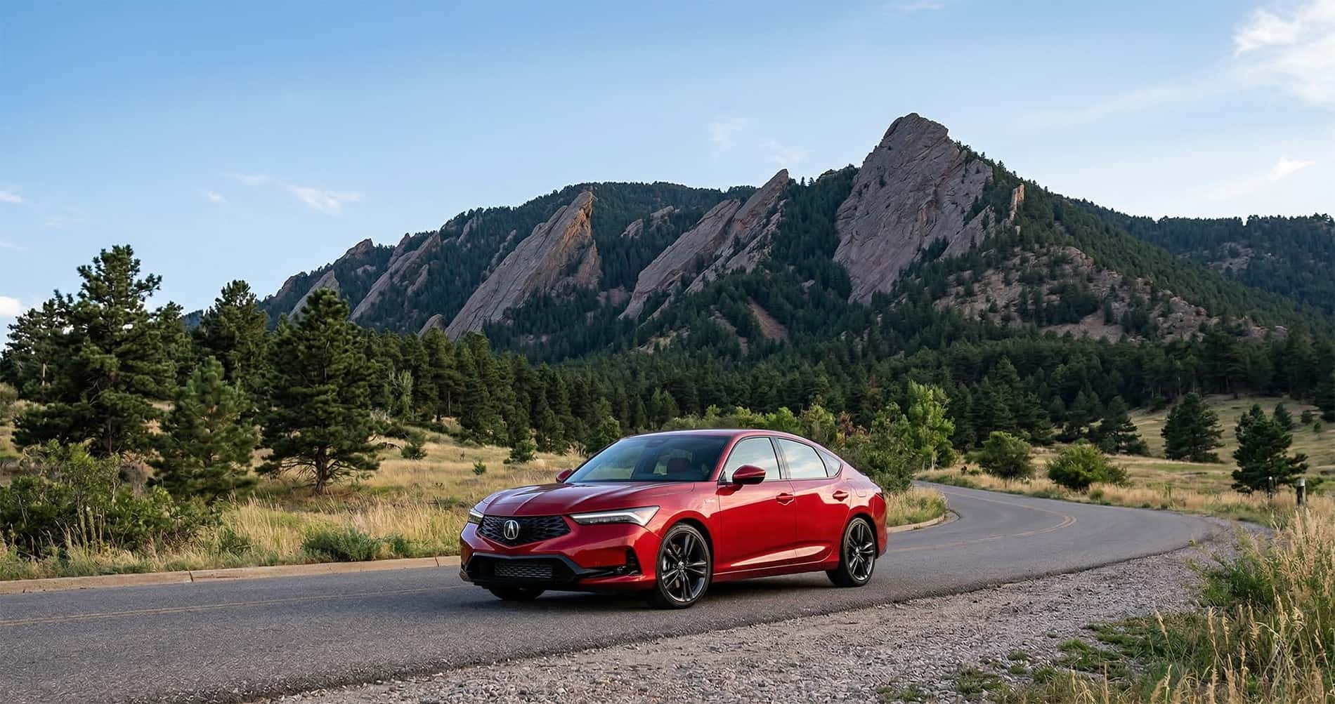 2026 Acura Integra driving near the Flatirons in Boulder Colorado highlighting everyday cargo space