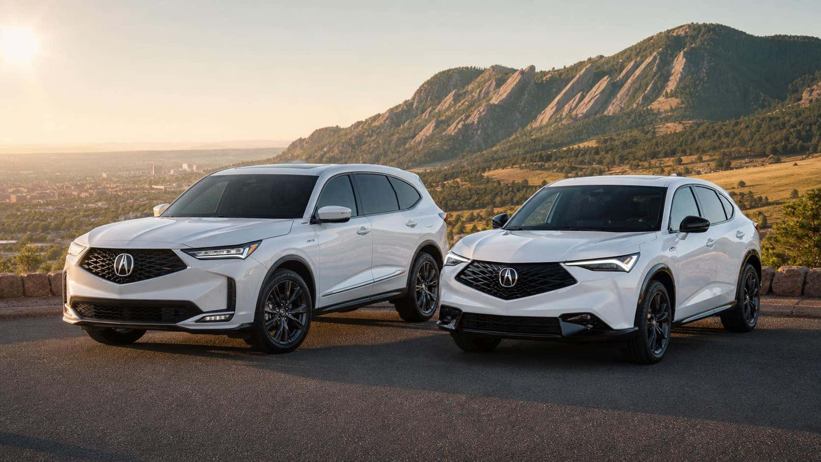 2026 Acura ADX and MDX parked on a mountain overlooking Boulder Colorado