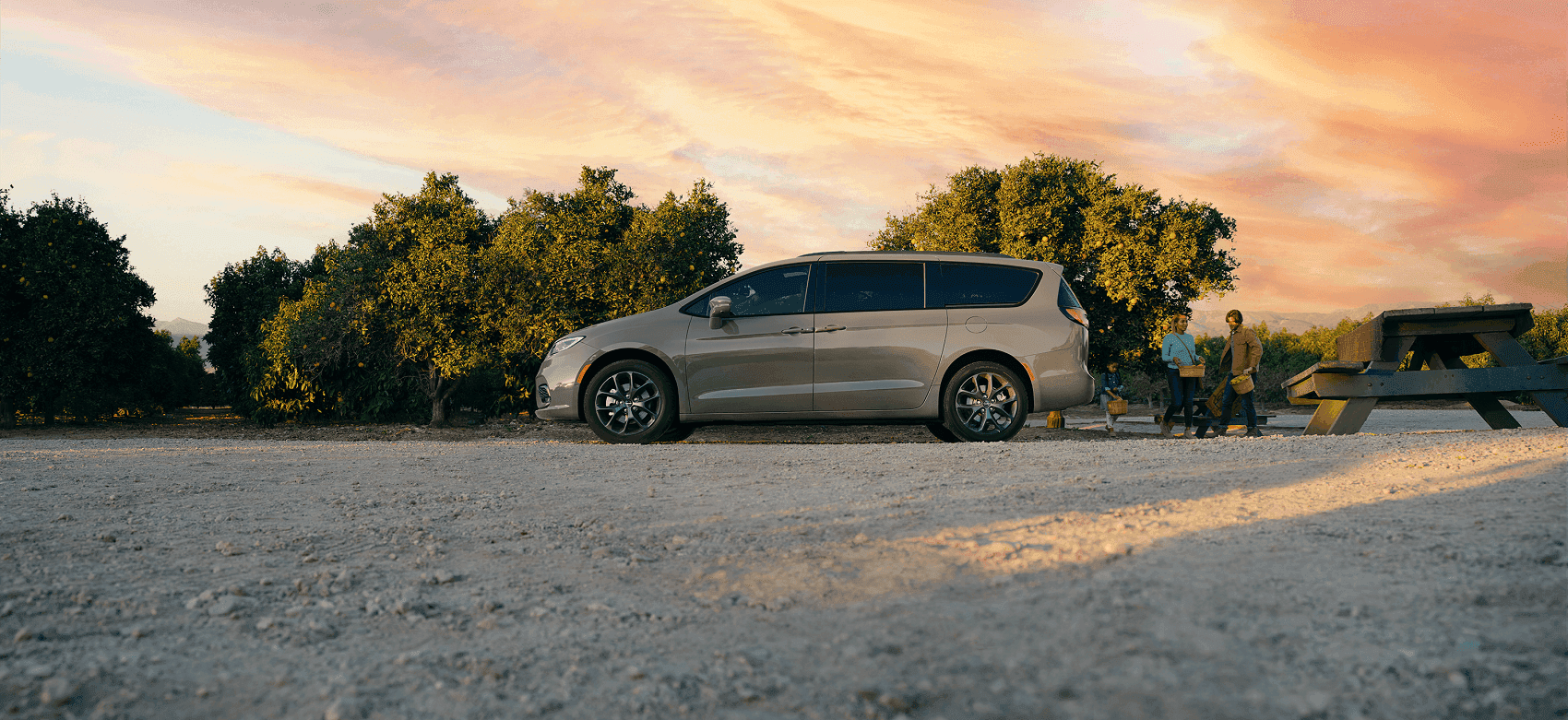 Family having a picnic near their Chrysler Pacifica