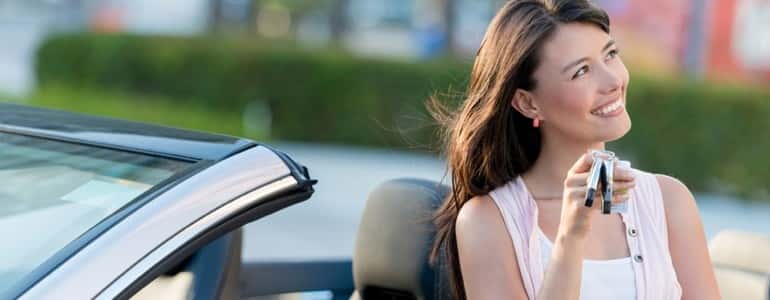 woman holding car keys 24994171