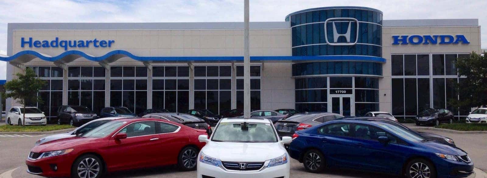 An exterior shot of Headquarter Honda dealership in Clermont, FL.