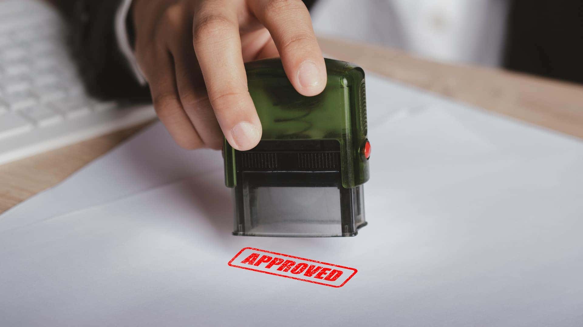Stamp with the word "Approved" in red