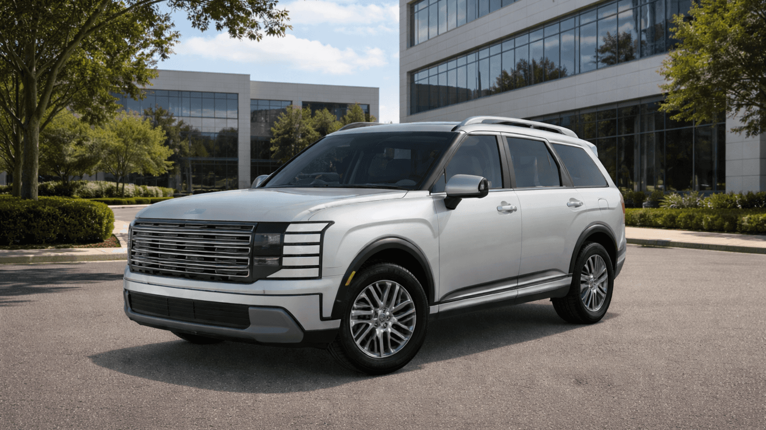 2026 Hyundai Palisade Hybrid SUV in silver, side view parked in corporate lot