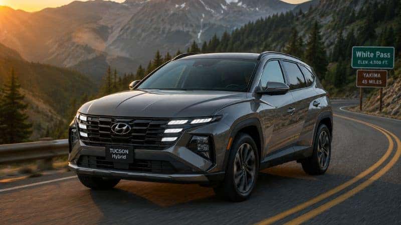 2026 Hyundai Tucson Hybrid driving on a mountain road near White Pass and Yakima