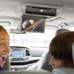 Kids watching Blu Ray of planets inside 2019 Toyota Highlander interior
