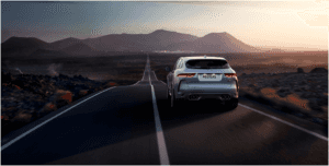 Silver Jaguar F-PACE SVR driving down road