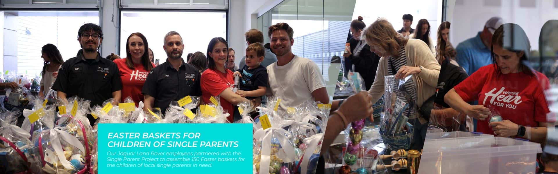 Group of people standing behind festive Easter Baskets