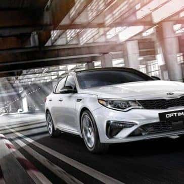2019-Kia-Optima-driving-white