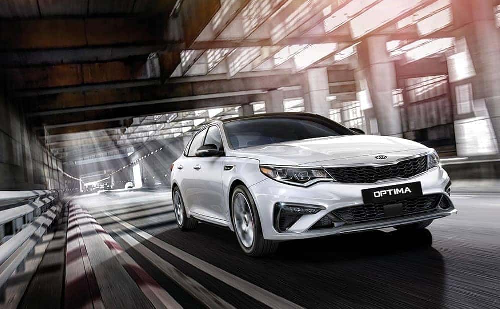 2019-Kia-Optima-driving-white