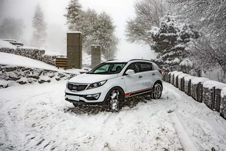 Kia on snowy road
