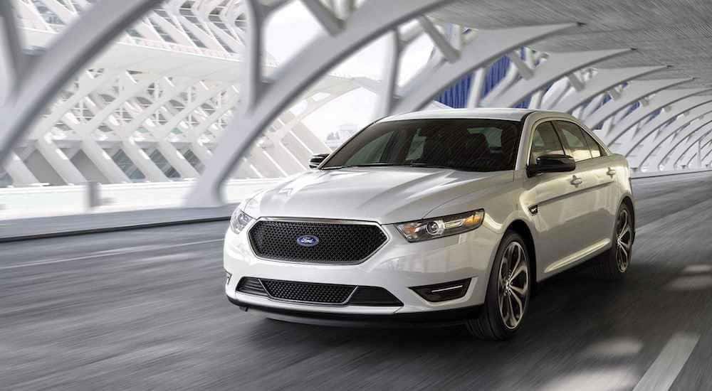 White 2018 Ford Taurus in bridge