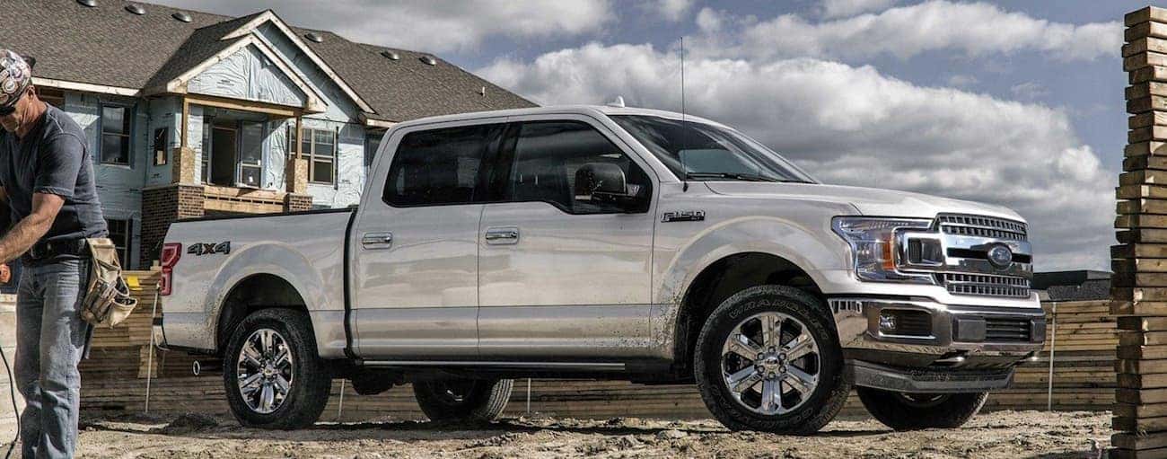 White 2019 Ford F150 at construction site