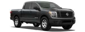 A gray 2019 Nissan Titan facing right on white