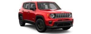 A red 2019 Jeep Renegade facing right on white