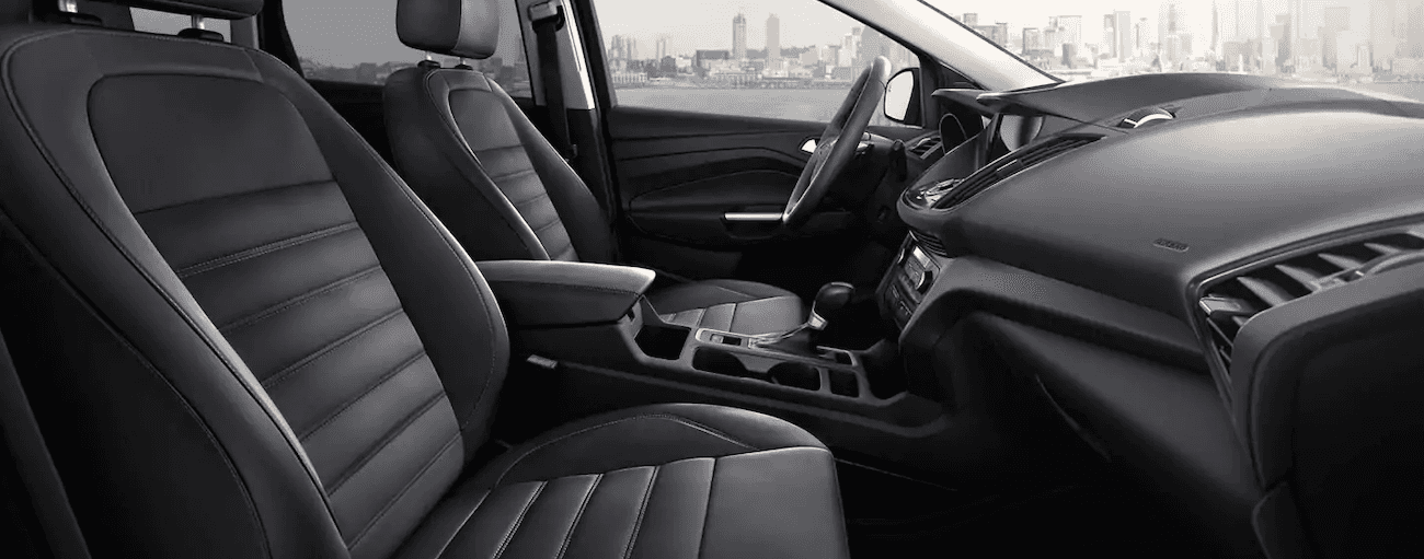 The interior of the 2019 Ford Escape in this image features a charcoal black color.