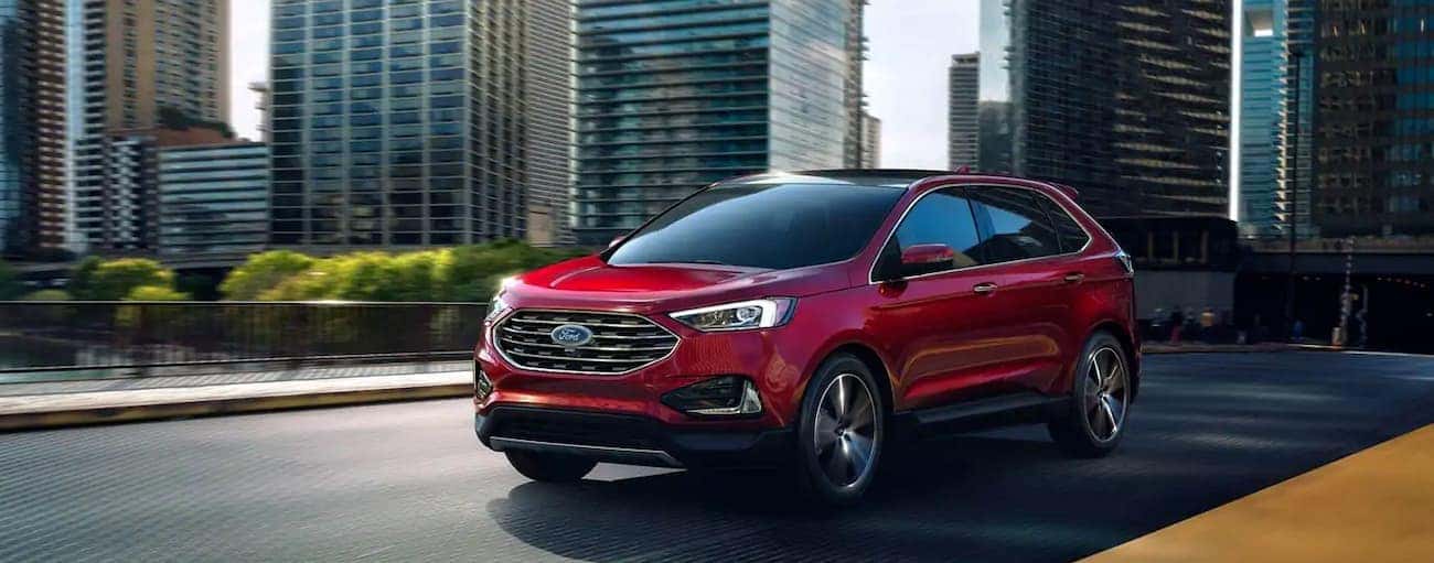 A red 2019 Ford Edge is driving out of Cincinnati, OH.