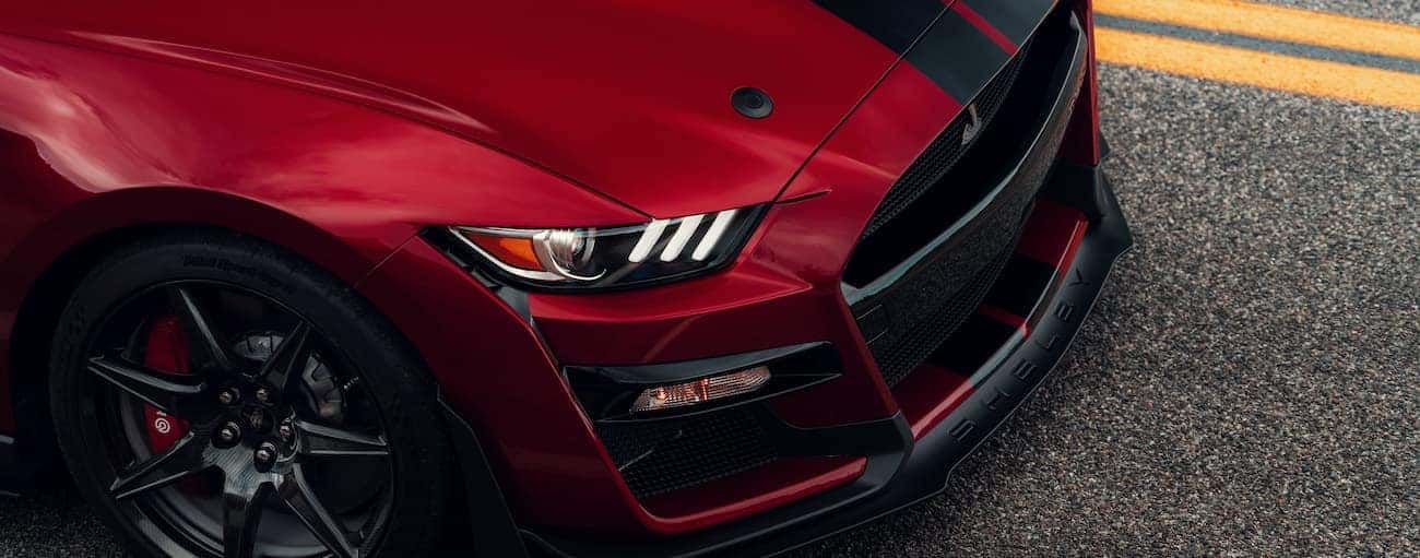 The front end of a red 2020 Shelby GT500 is shown.