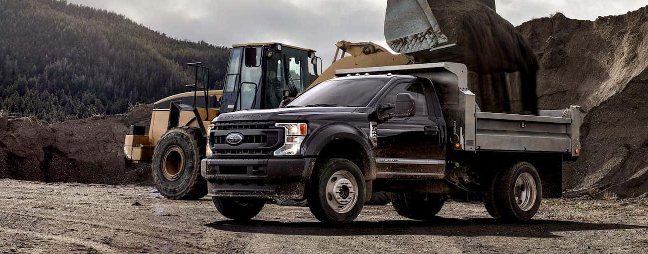 A black 2020 Super Duty Ford F-600 is at a construction site near Cincinnati, OH.
