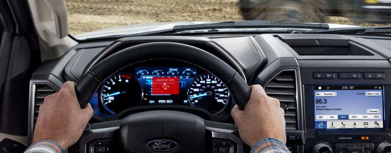 A collision warning light is on the dash display of a 2020 Super Duty.