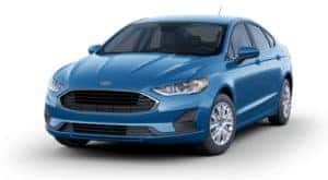 A blue 2020 Ford Fusion is facing left.