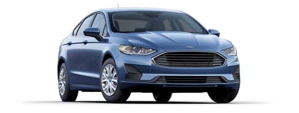 A blue 2019 Ford Fusion is facing right.