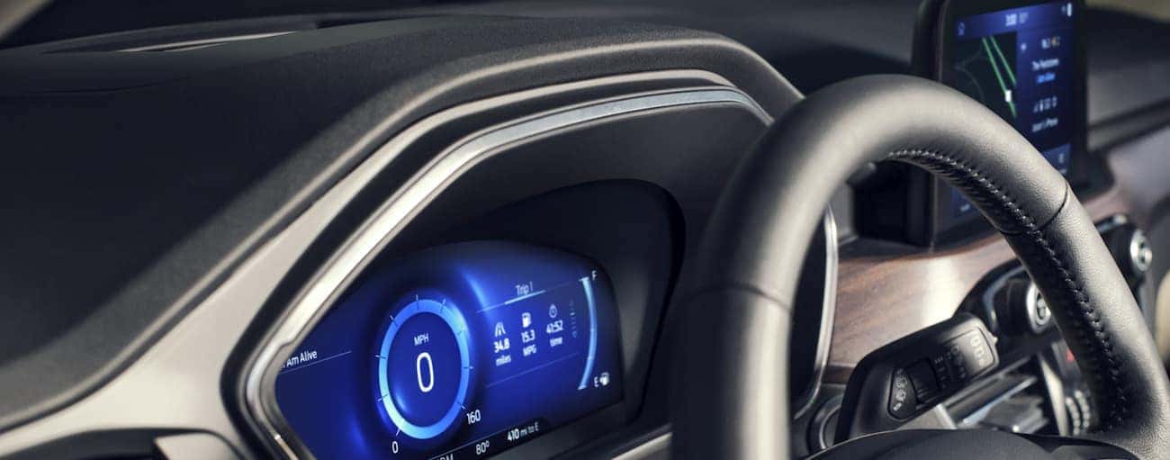 A close up of the drivers display and the infotainment system of the 2020 Ford Escape is shown.