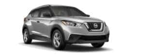 A silver 2020 Nissan Kicks is facing right.