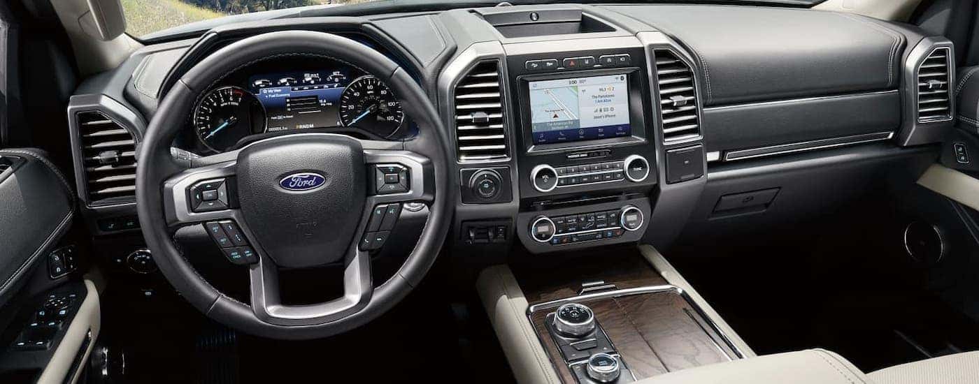 The dashboard and front seats of a 2020 Ford Expedition are shown.