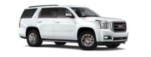 A white 2020 GMC Yukon is angled right.
