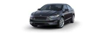 A black 2020 Ford Fusion is facing left.