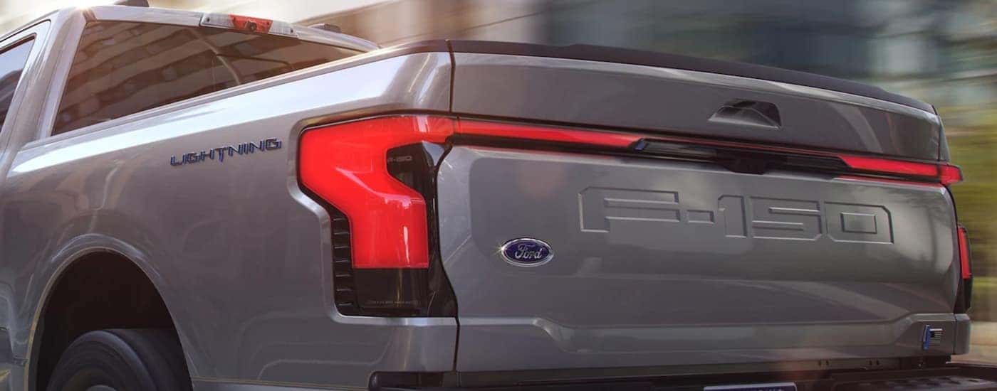 A close up shows the bed of a grey 2022 Ford Lightning.