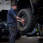 technician working on tire
