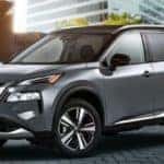 Side view of a silver 2022 Nissan Rogue SL